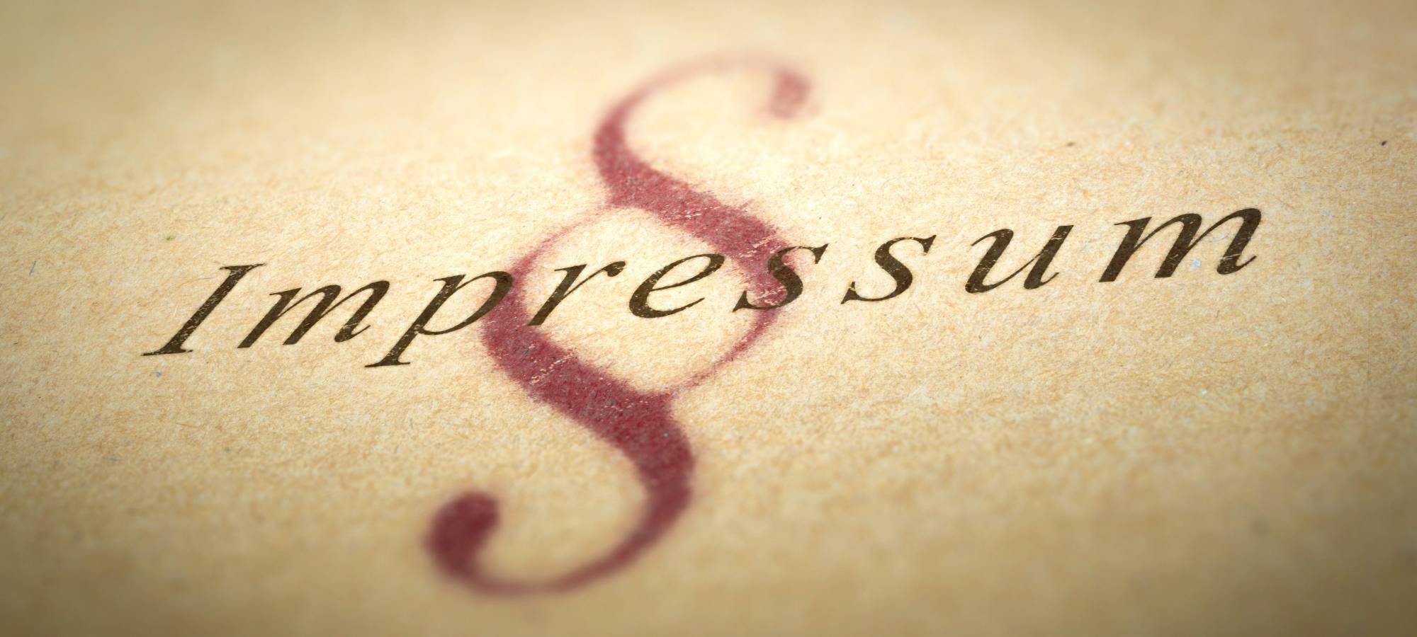 Symbolbild mit dem Wort Impressum